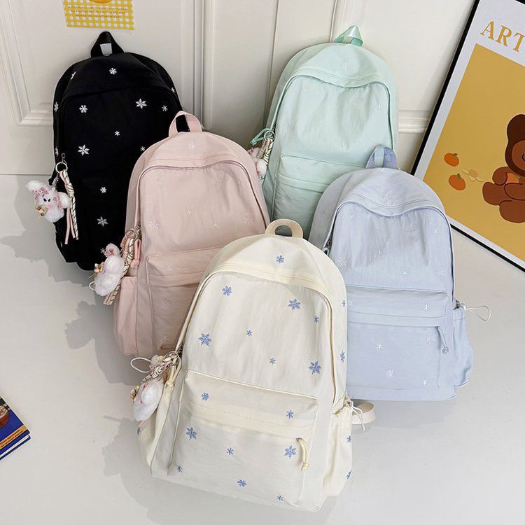 Playful backpack with fine embroidery Stornfield