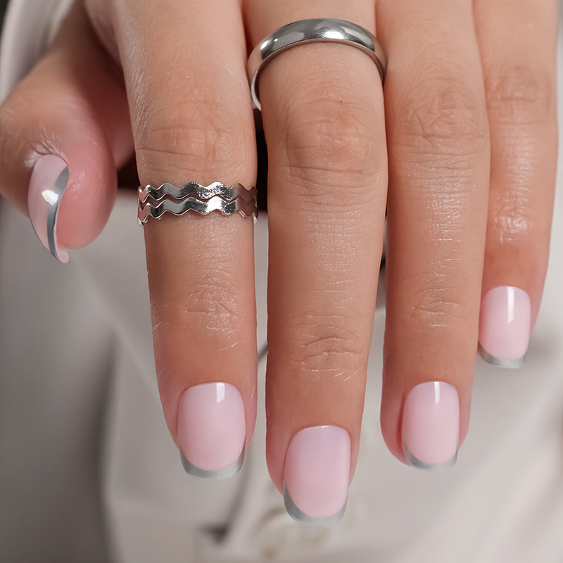Artificial Nails in Natural French Tip Design Stornfield