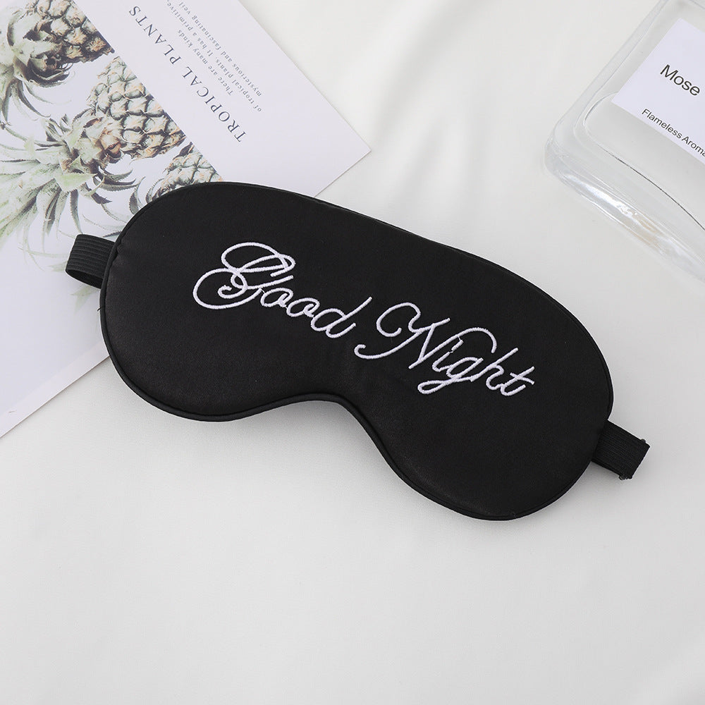 Unisex embroidered contoured sleep mask with decorative text embroidery and adjustable elastic band Stornfield