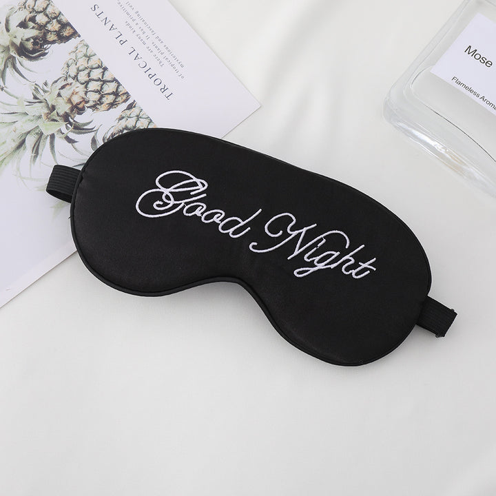 Unisex embroidered contoured sleep mask with decorative text embroidery and adjustable elastic band Stornfield
