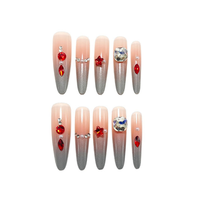 Sparkling artificial nails with decorative rhinestones Stornfield