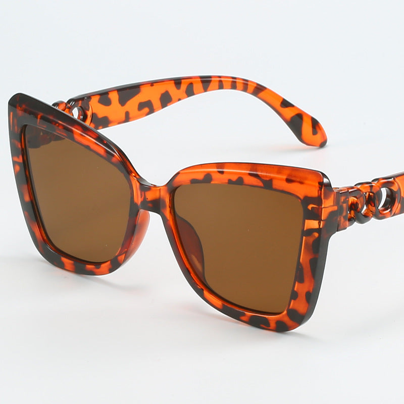Ladies modern cat-eye sunglasses with clear frame and UV protection Stornfield