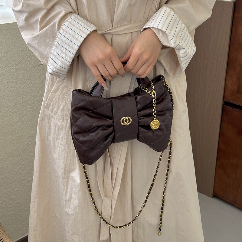 Quilted Bow Accent Handbag