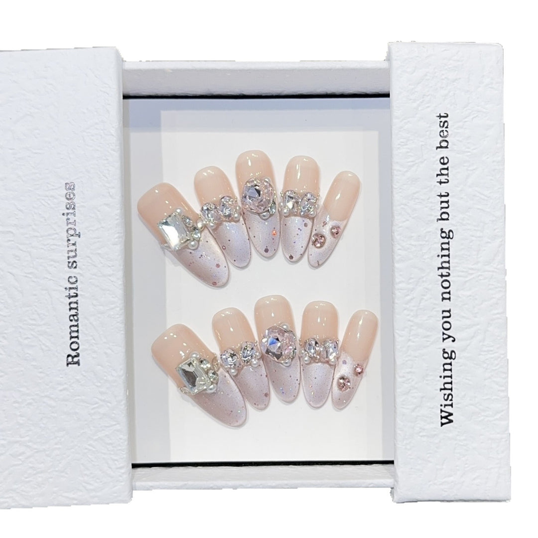 Romantic artificial nails with glitter decoration Stornfield