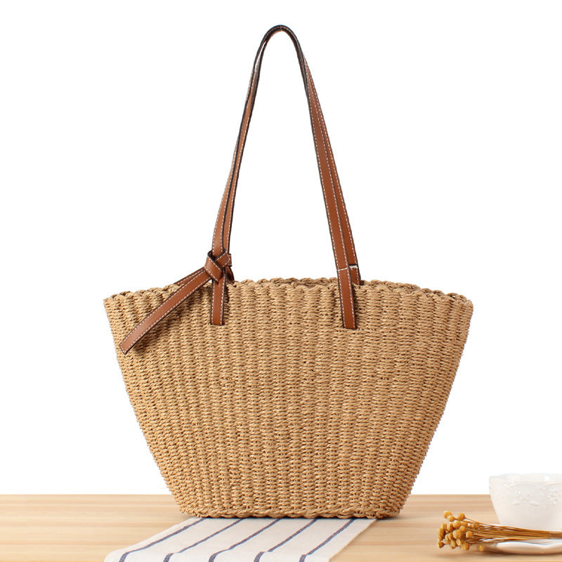 Natural raffia tote bag with elegant leather detail Stornfield