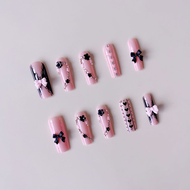 Fake nail set with playful 3D roses and elegant accents Stornfield