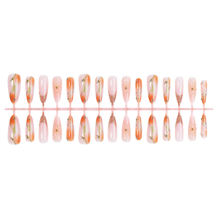 Nail art set with floral designs and glitter accents Stornfield