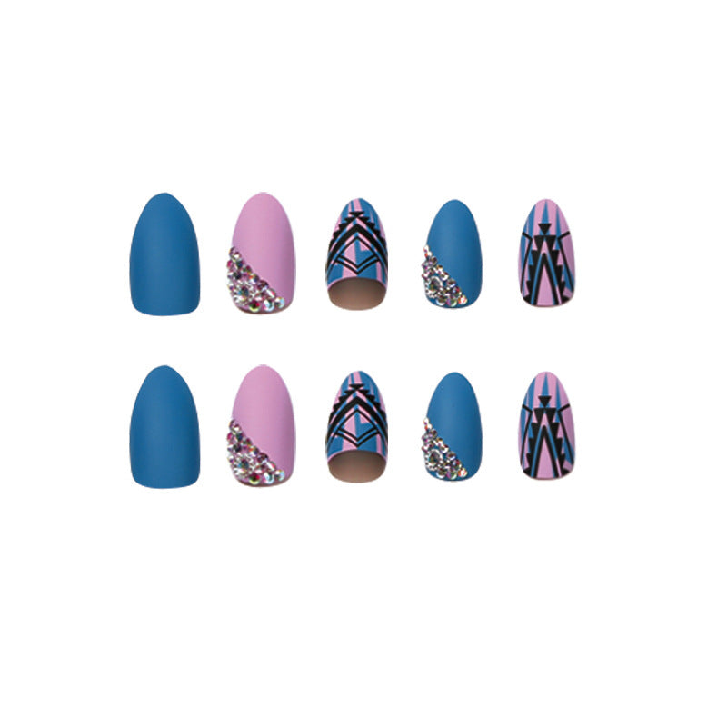 Artful stiletto nails with modern geometric designs and rhinestone embellishments Stornfield