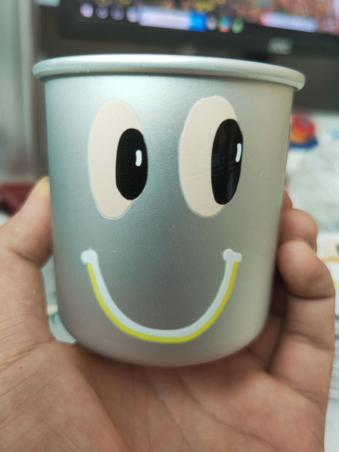 insulated stainless steel smiley-face cup with reusable lid non-slip base and kid-friendly grip Stornfield
