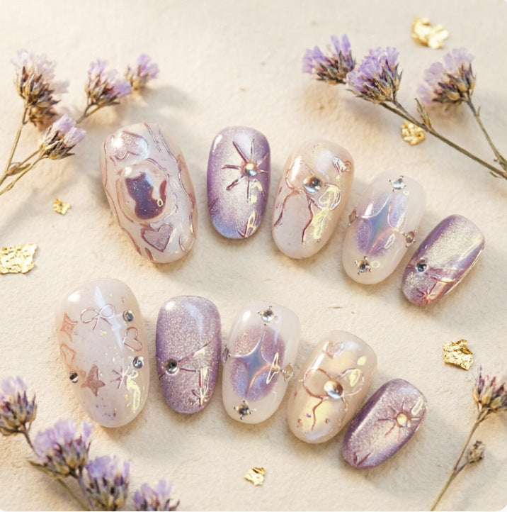 Artificial nails with playful bow and star design Stornfield