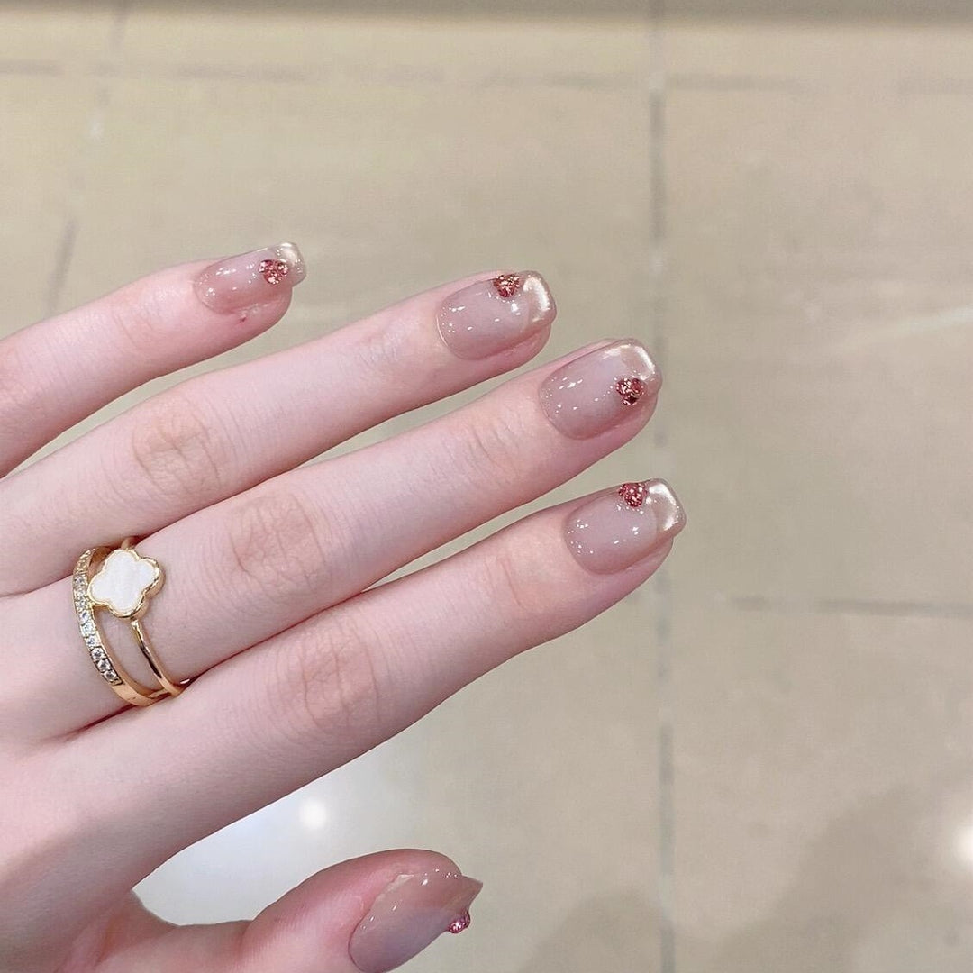 Artificial nails with elegant glitter details Stornfield