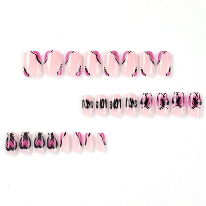 Creative Nail Art with Heart and Butterfly Design Stornfield