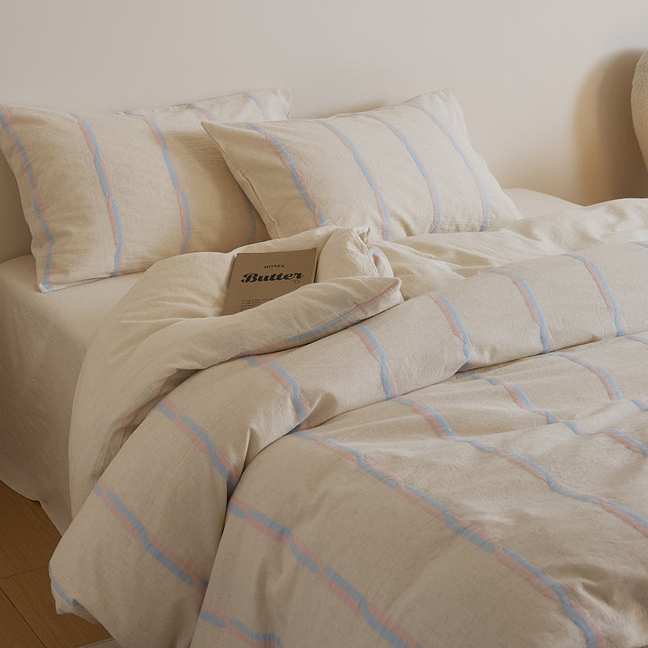 Cotton-linen duvet cover set with brush stroke stripes and airy muslin texture