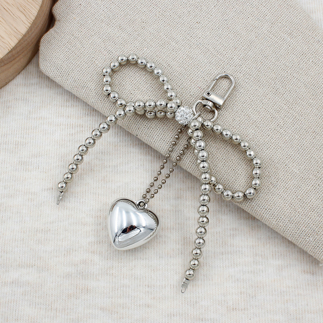 Elegant Pearl Bow Keychain Stornfield