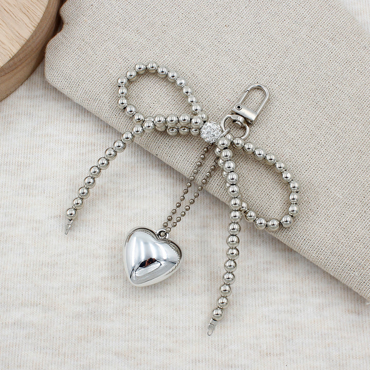 Elegant Pearl Bow Keychain Stornfield