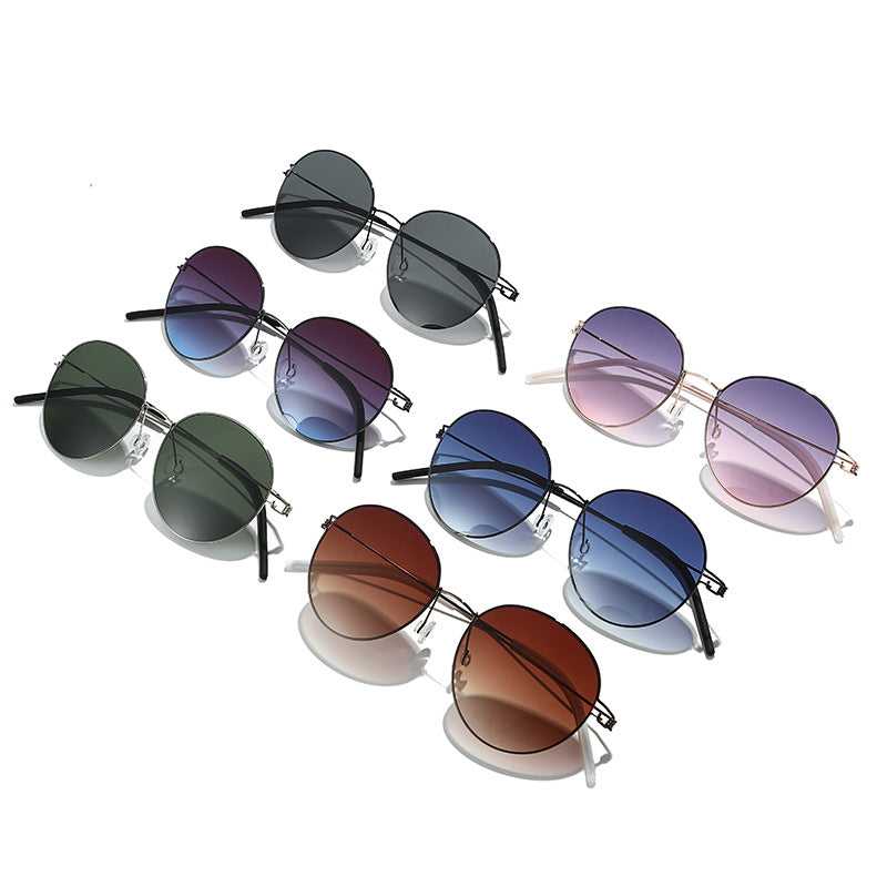 Women round sunglasses with light metal frame and gradient lenses Stornfield