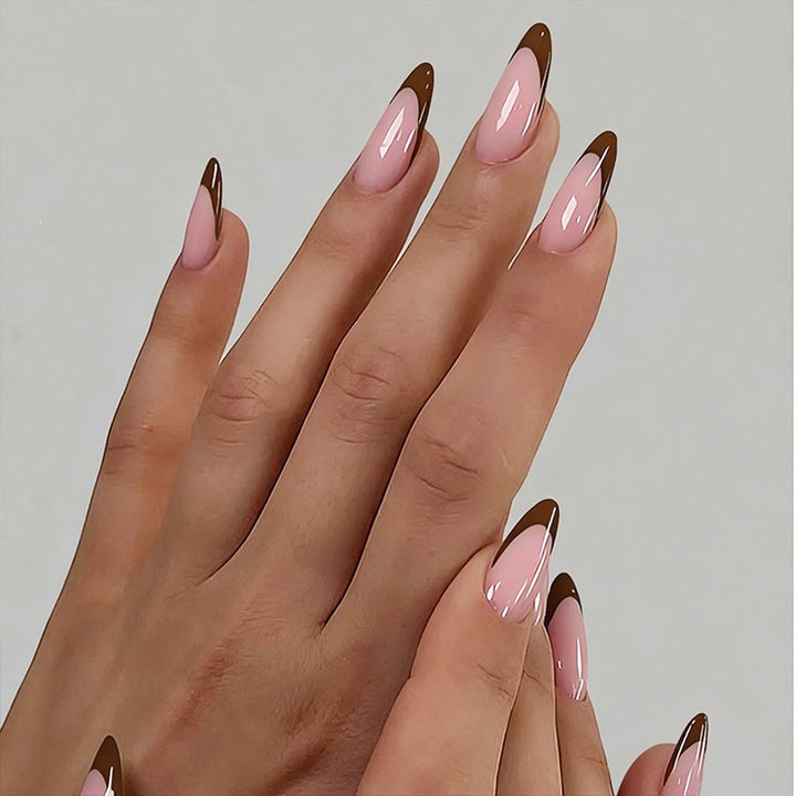 Acrylic nail set with luxurious color gradient and elegant lace accent Stornfield