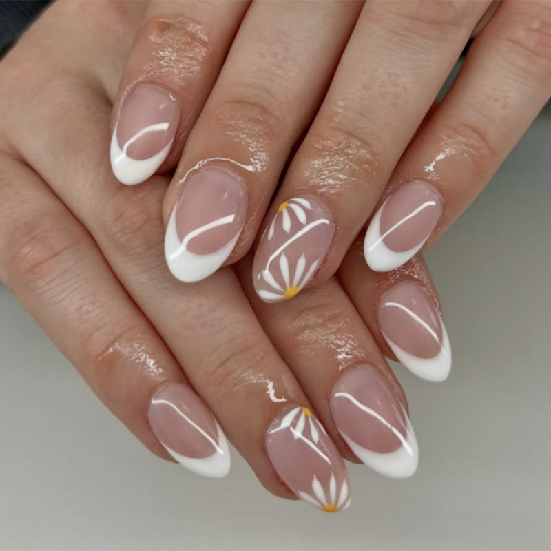 Elegant Nail Art with Floral Designs Stornfield