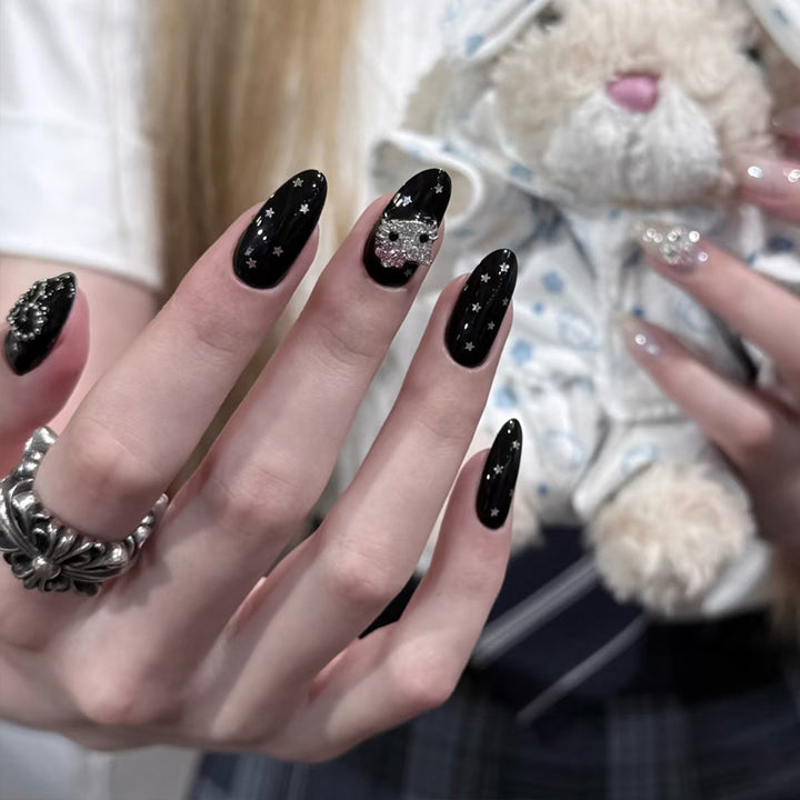 Artistic Press-On Nails with Star and Skull Accents Stornfield