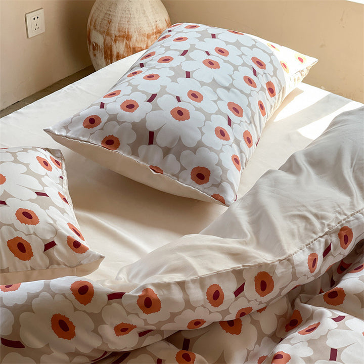 Satin bedding set with floral print and ruffle