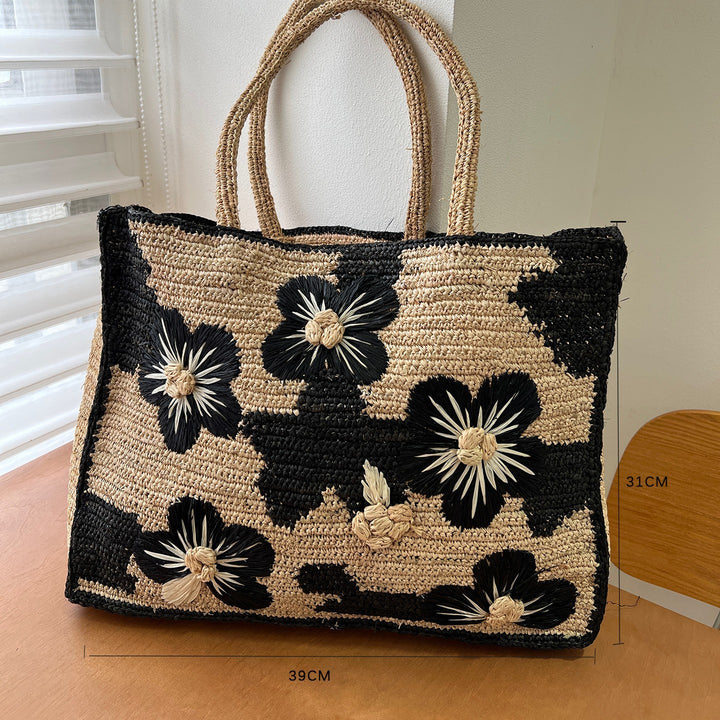 Handcrafted knitted bag with floral design Stornfield