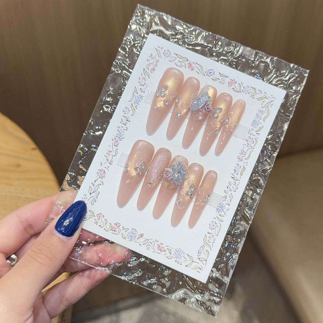 Artificial nails with romantic floral and glitter details Stornfield