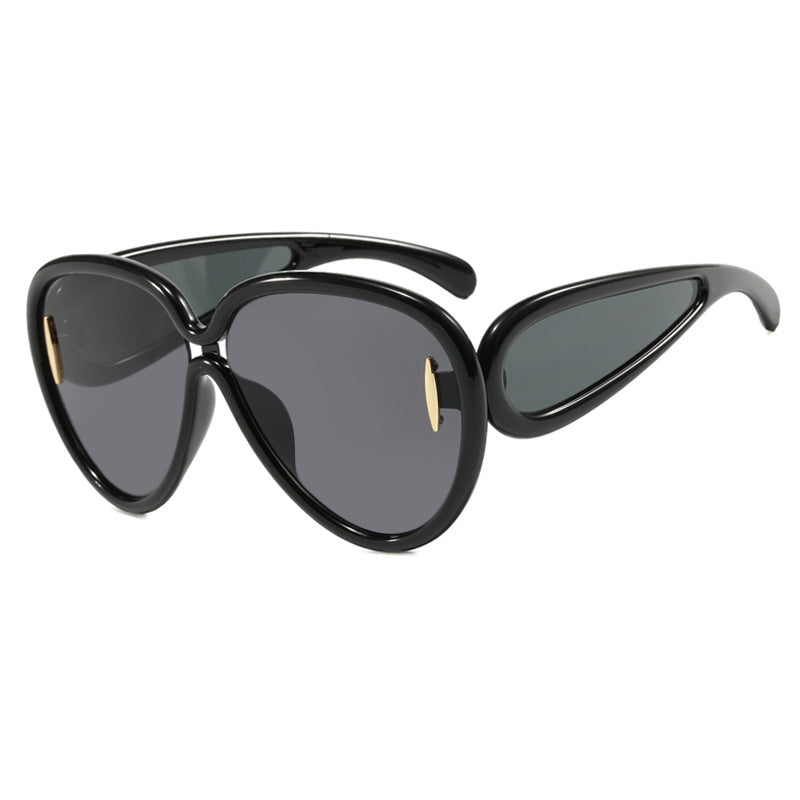 Women extravagant sunglasses in creative design Stornfield