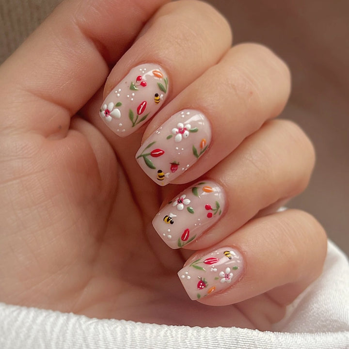 Artificial nail set with cheerful flower and bee designs Stornfield