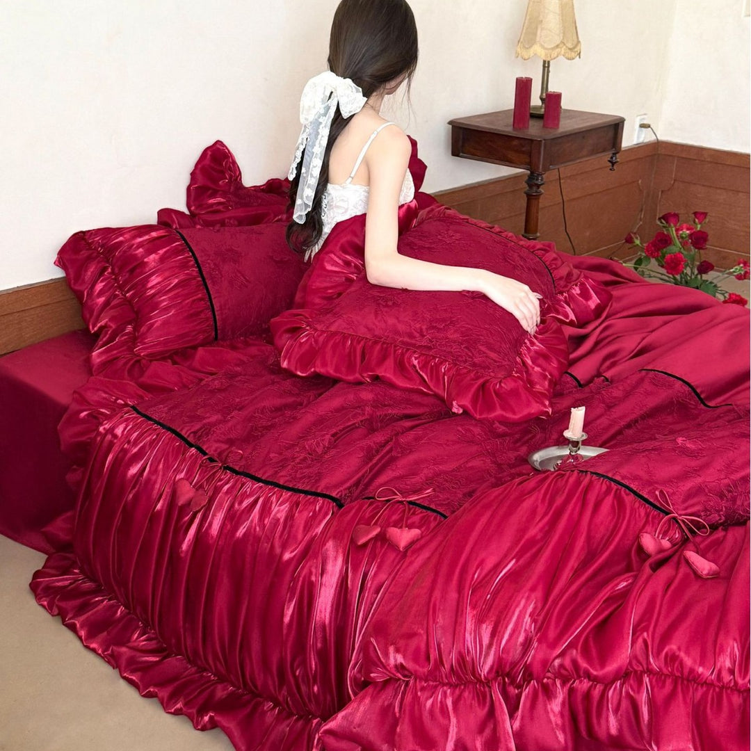 Opulentes Satin Bedding Set with Ruffle Trim, Jacquard Texture and Heart Appliqué