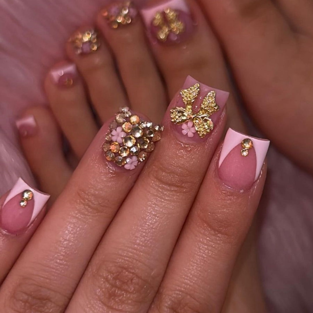 Glamorous Rhinestone and Floral Nail Art Stornfield