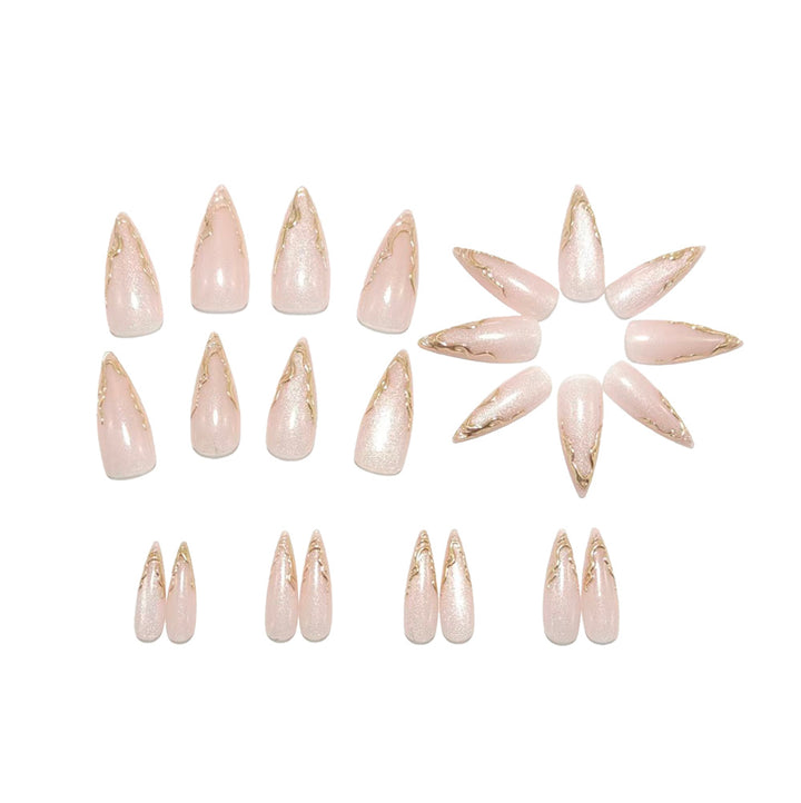 Artificial nails in elegant stiletto design with golden accents Stornfield