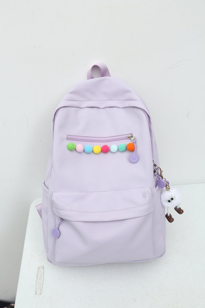 Practical backpack with colorful applications Stornfield