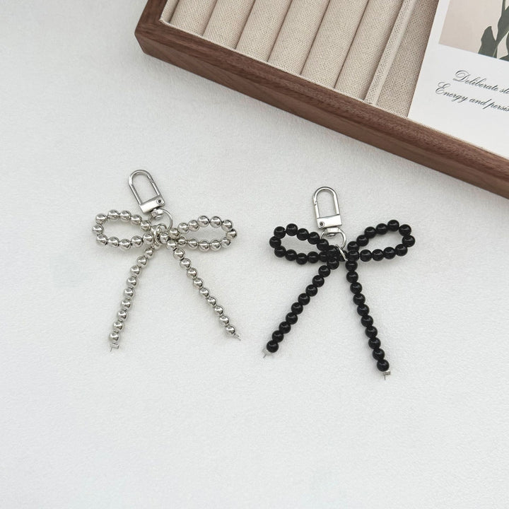Elegant Pearl Bow Keychain Stornfield