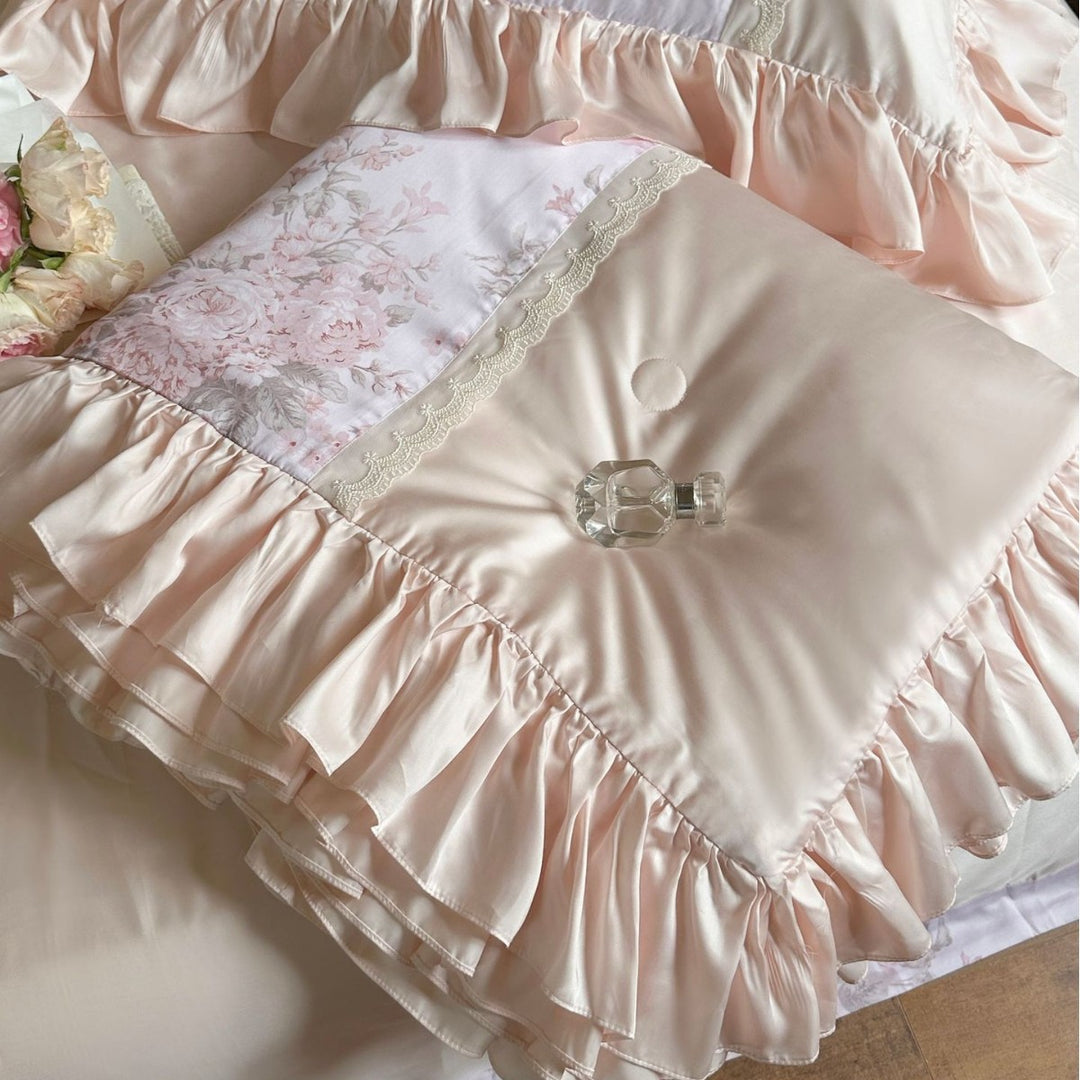 Ruffled satin pillowcase with flounce, lace border, and floral insert