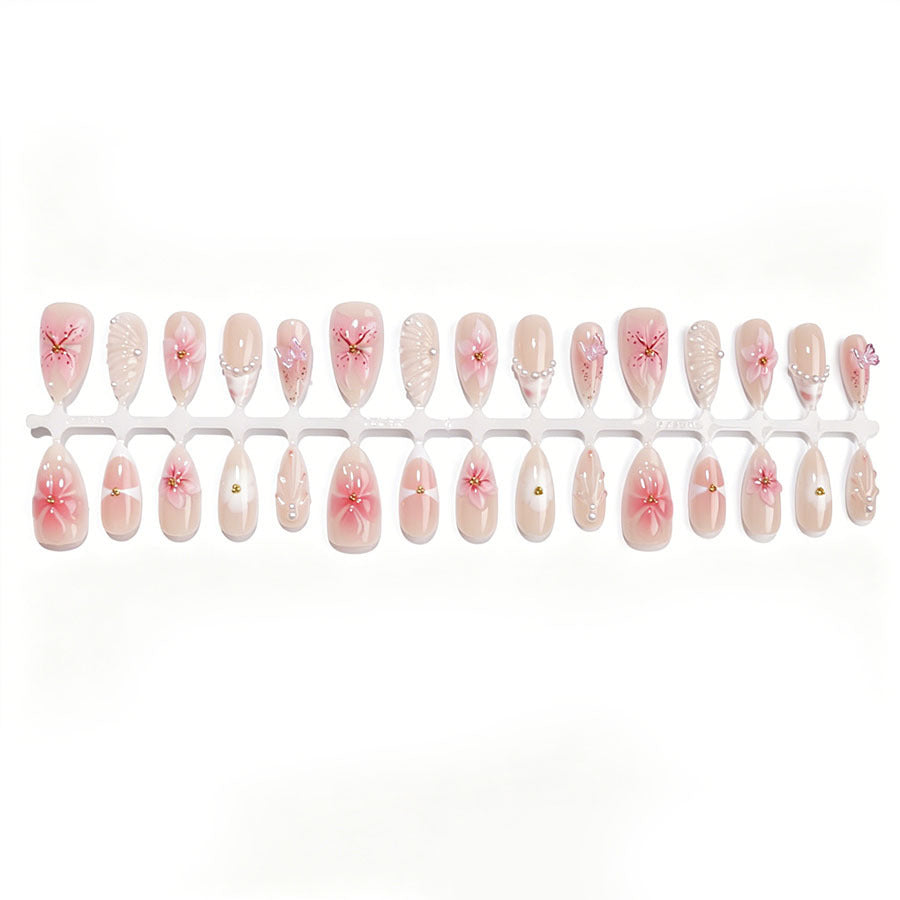 Artificial nail set with floral decorations and 3D accents Stornfield