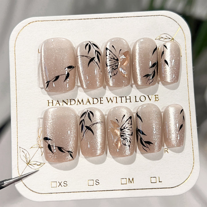 Artificial nail extensions with floral butterfly design Stornfield