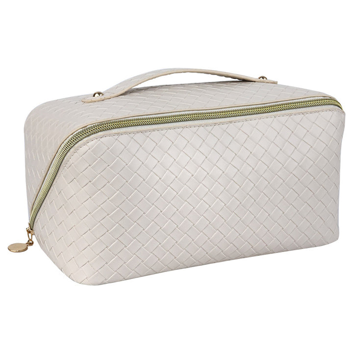 Cosmetic transport bag made of high-quality braided synthetic leather with practical zipper and carrying handle Stornfield