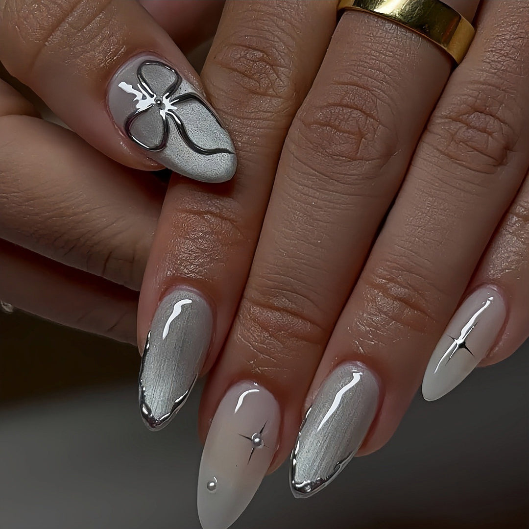 Elegant Stiletto Nail Art Extensions with Silver Accents Stornfield