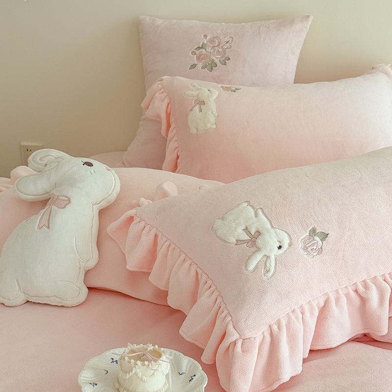 Luxurious bedding set with ruffles and floral embroidery