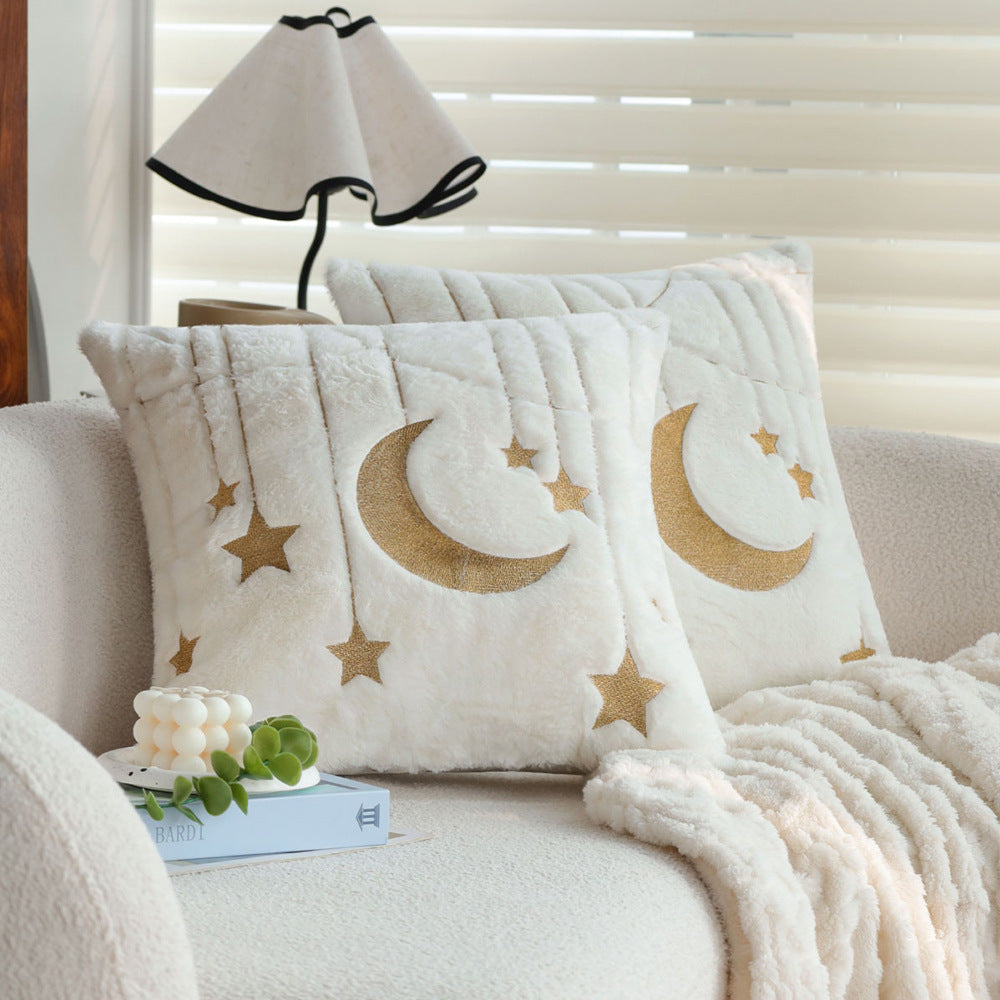 Cuddle pillow with star and moon motif