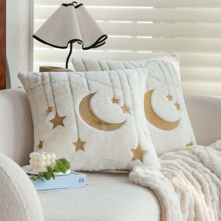 Cuddle pillow with star and moon motif