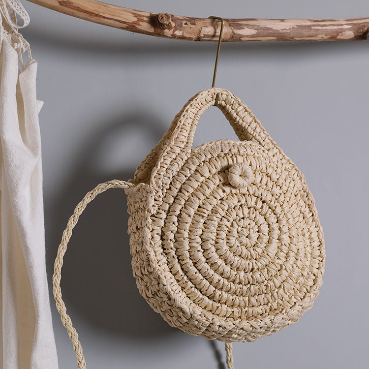 Handcrafted Round Wicker Bag with Elegant Closure Stornfield