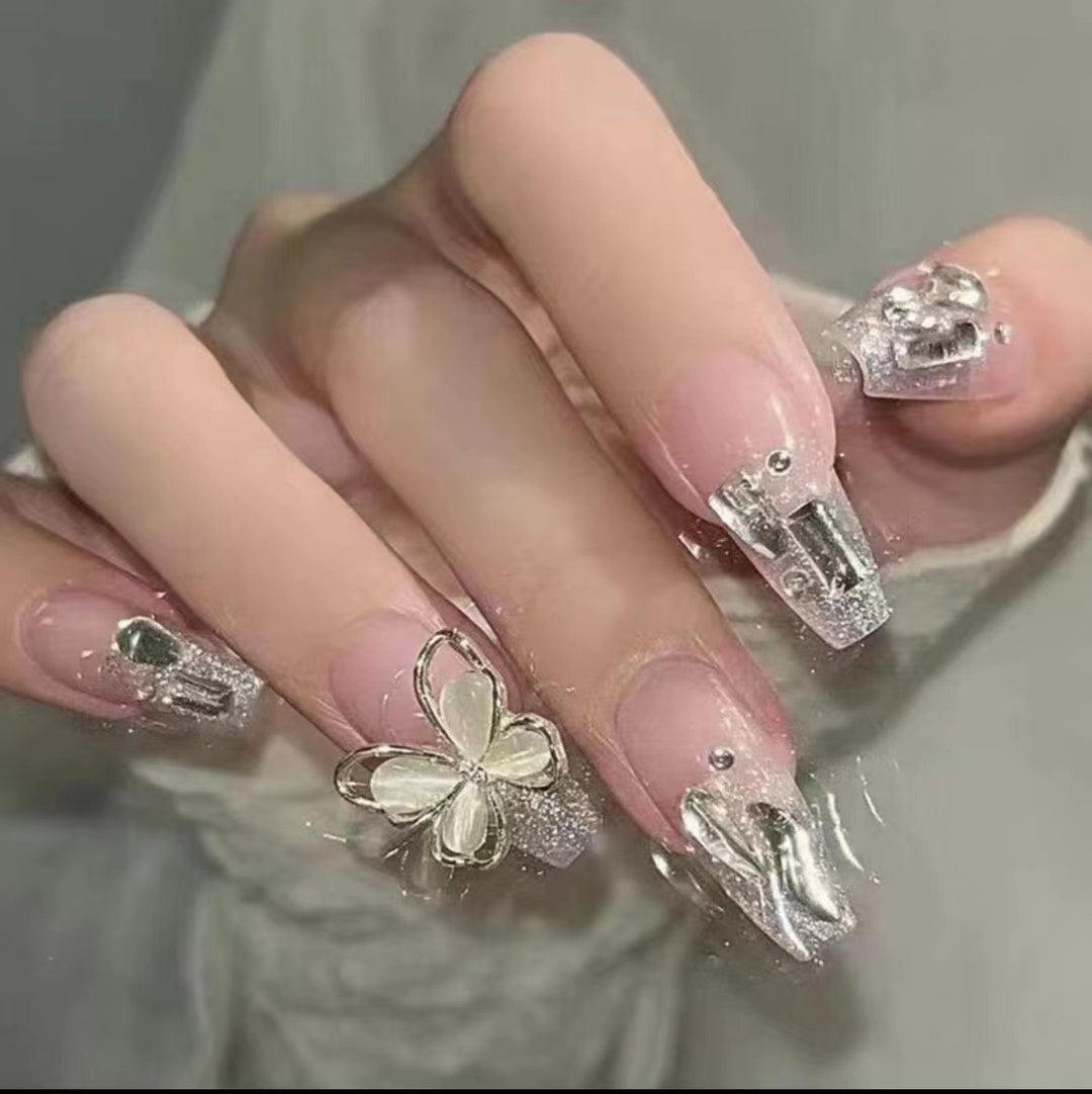 Elegant Nail Art with Glitter and Rhinestones Stornfield