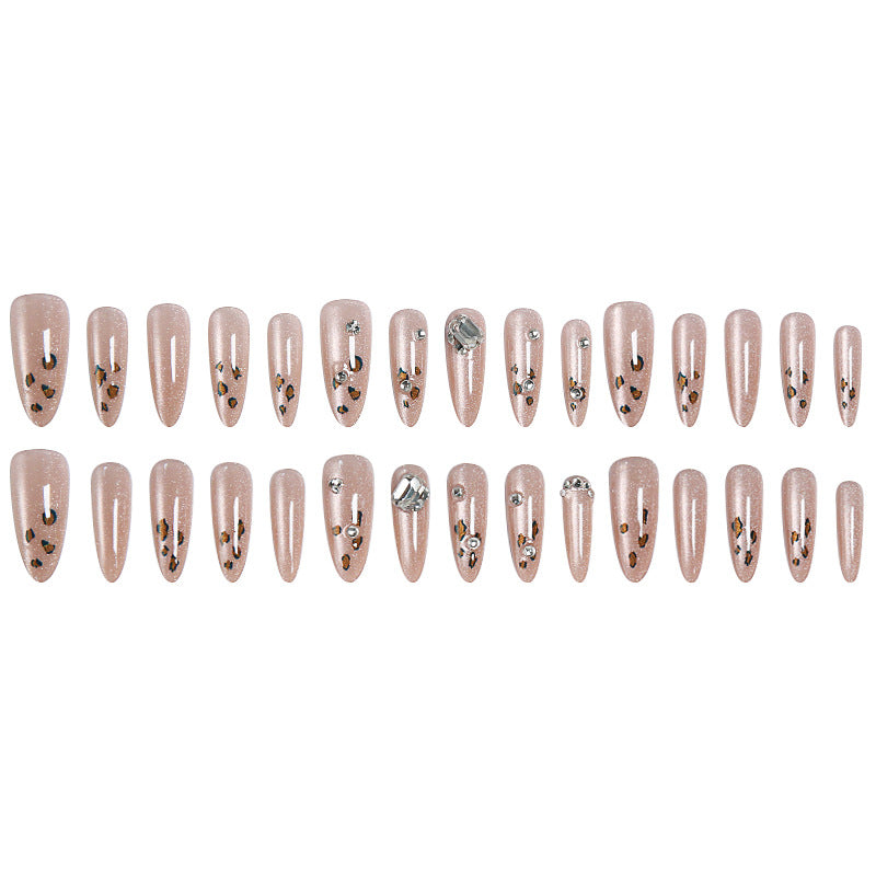 Glamorous artificial nail set with fun leopard pattern and glittering accents Stornfield