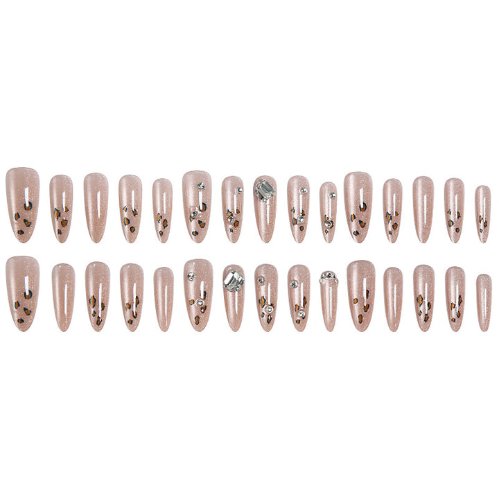 Glamorous artificial nail set with fun leopard pattern and glittering accents Stornfield