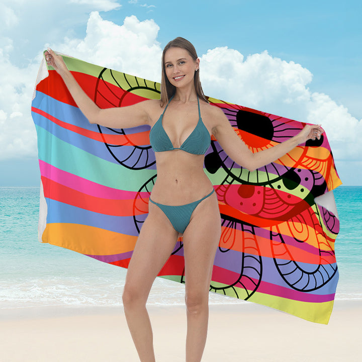 Beach towel with vibrant tropical plant motif Stornfield