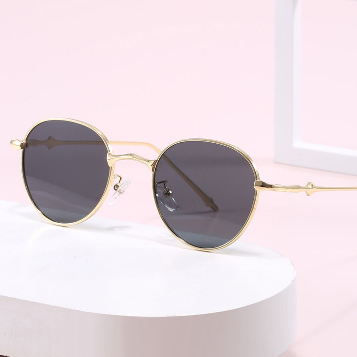 Ladies elegant round sunglasses with stylish metal frame Stornfield