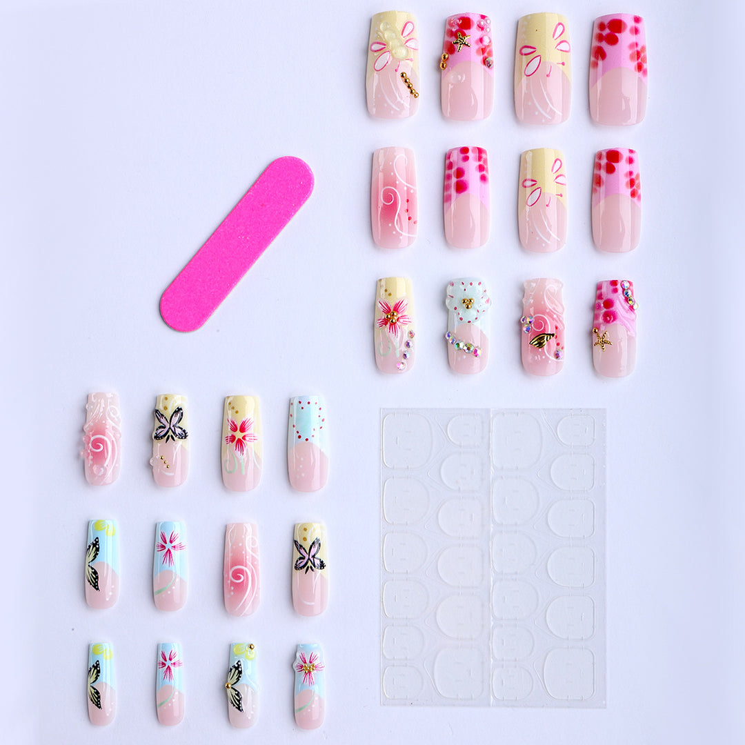 Artistic nails with floral accents and glitter clusters Stornfield