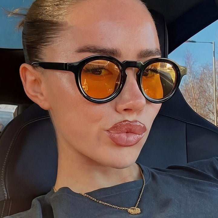 Women's fashionable round sunglasses with transparent frame and UV protection Stornfield