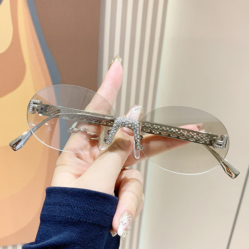 Women's sunglasses with glittering frame and oval lenses Stornfield